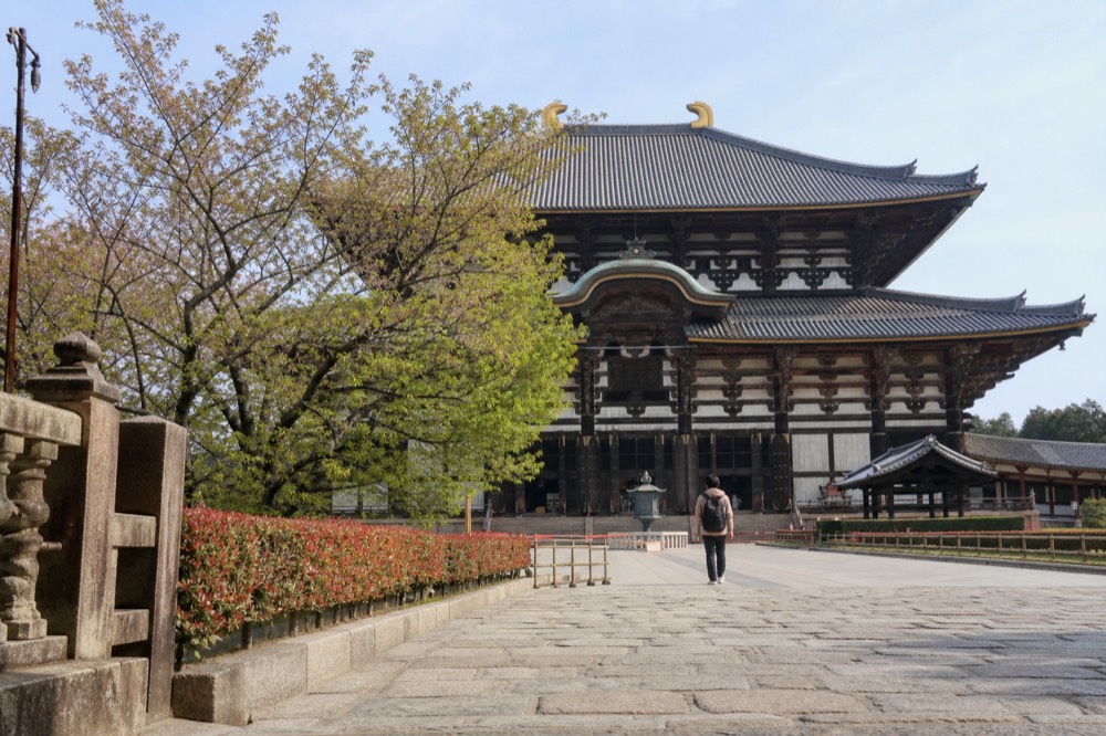 The wooden facade of the Great Buddha hall at Todai-ji seen from its stone approach